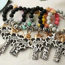 Cute Cow Pattern Silicone Beads Tassel Wristlet Keychain - A Kawaii Wooden Bead Bracelet Gift For Men & Women!