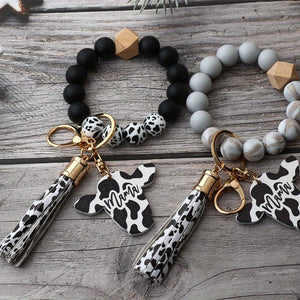 Cute Cow Pattern Silicone Beads Tassel Wristlet Keychain - A Kawaii Wooden Bead Bracelet Gift For Men & Women!